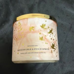Bath and Bodyworks, honeysuckle, and peach spritz candle